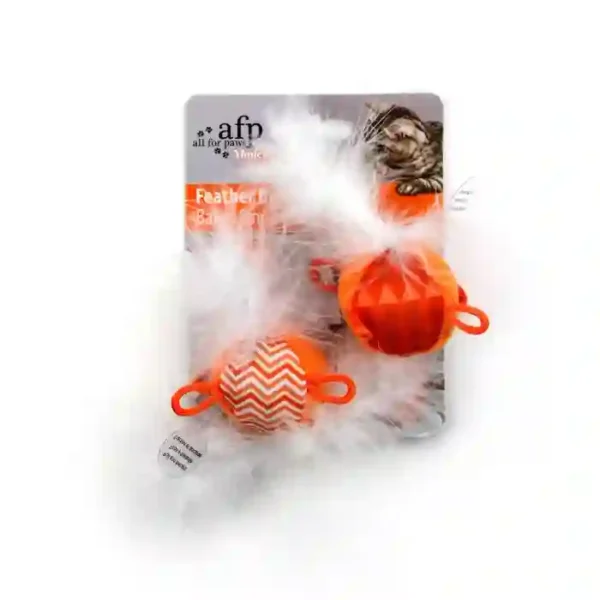 Orange cat toy balls with feathers attached.