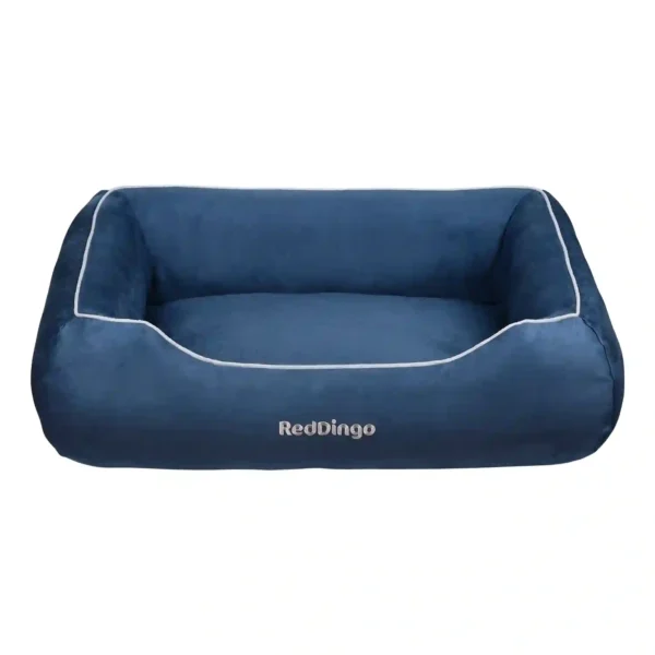 Blue rectangular dog bed with white trim.