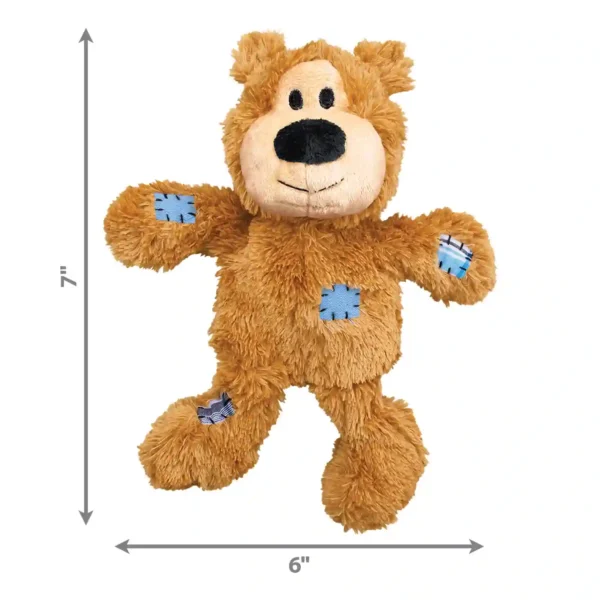 Brown plush bear toy with blue patches, 7x6 inches.