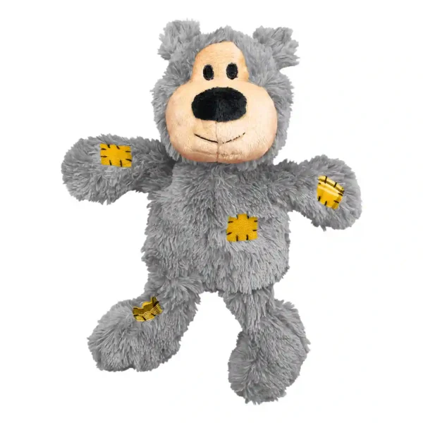 Grey plush bear with yellow patches, smiling face.